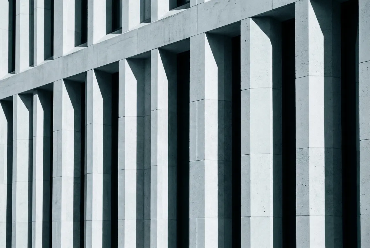 A stone colonnade in raking light